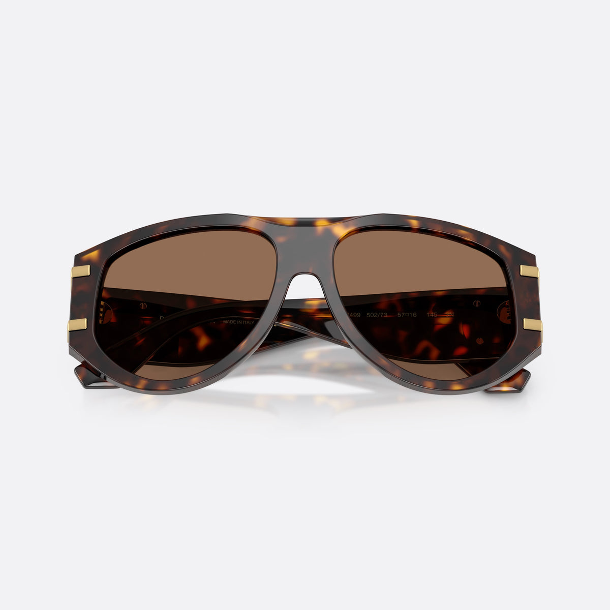 Dolce & Gabbana DG4499 502/73 sunglasses, havana pilot frame for women, plain saddle bridge, brand logo plaque on temple, folded