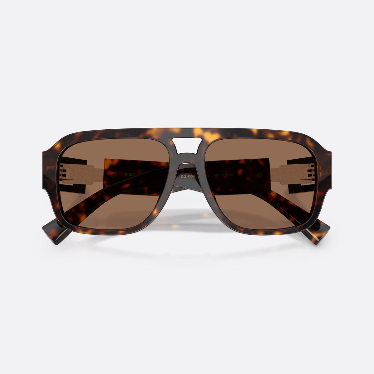 Dolce & Gabbana DG4506 502/73 sunglasses, havana pilot frame for men, keyhole bridge, silver-tone plaque on temple, folded