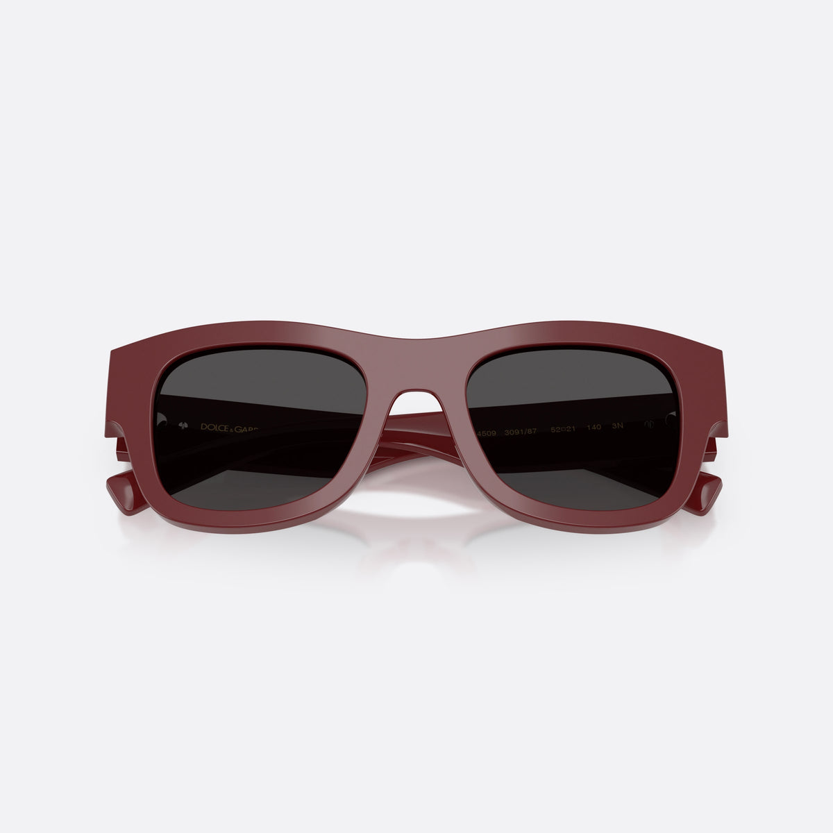 Dolce & Gabbana DG4509 309187 sunglasses, red square frame for men, plain bridge, brand logo on plaque, full-rim frame, folded