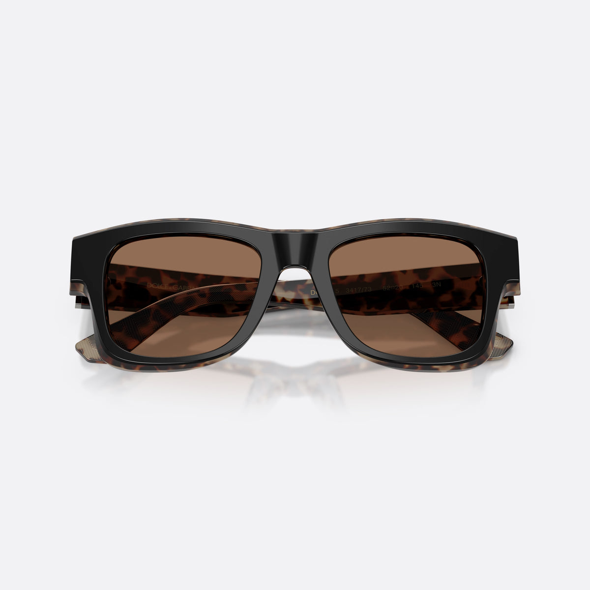 Dolce & Gabbana DG4515 341773 sunglasses, black square frame for men, plain bridge, brand lettering on temple, full-rim frame, folded