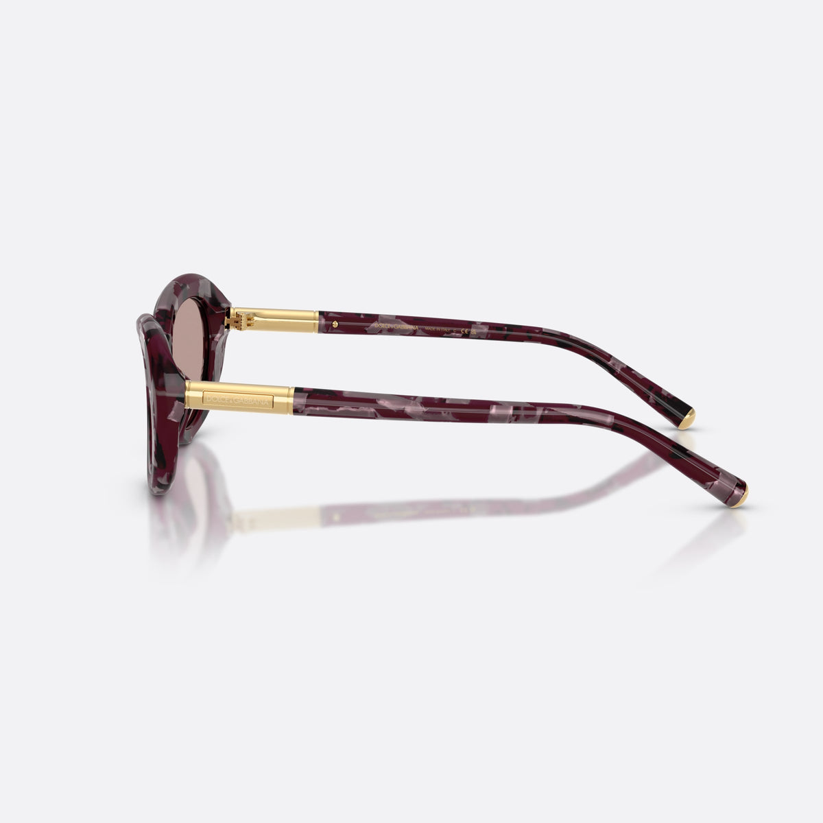Dolce & Gabbana DG4519 34647N sunglasses, violet oval frame for women, plain bridge, brand lettering on temple, gold-tone hinges, side view