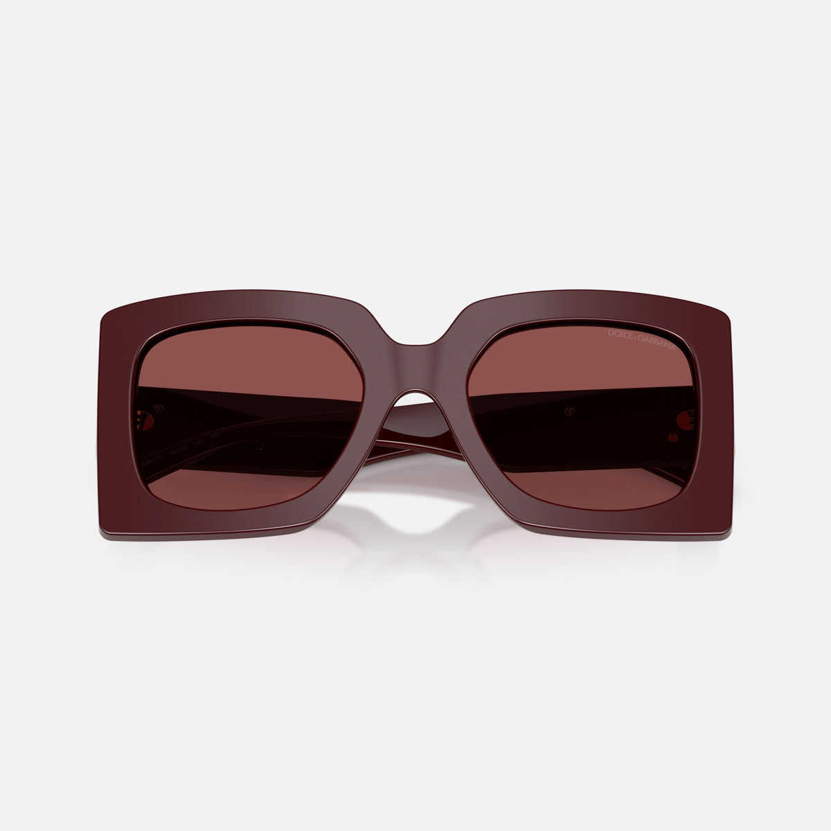 Dolce & Gabbana DG4525B 309175 sunglasses, red square frame for women, plain double bridge, brand lettering on the front rim, folded