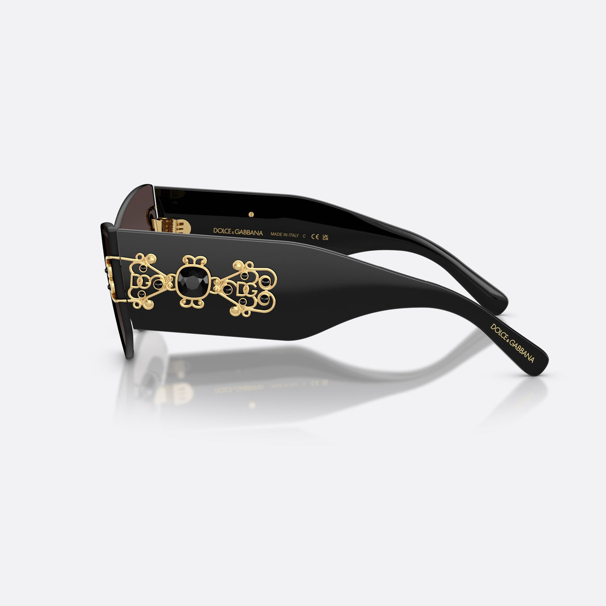 Dolce & Gabbana DG4526B 501/8G sunglasses, black cat eye frame for women, brand logo on temples, wide tapered temples, side view