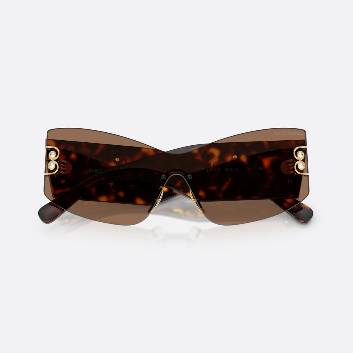 Dolce & Gabbana DG4526B 502/73 sunglasses, havana cat eye frame for women, brand lettering on temples, wide tapered temples, folded