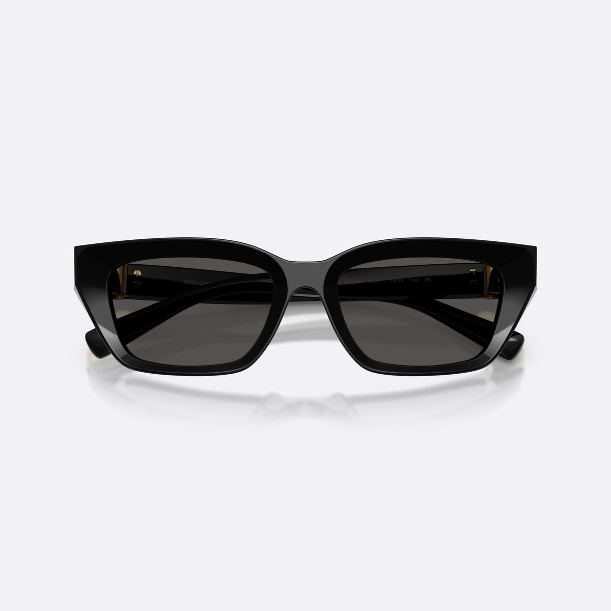 Dolce & Gabbana DG4532 501/87 sunglasses, black cat eye frame for women, plain double bridge, brand lettering on temples, folded