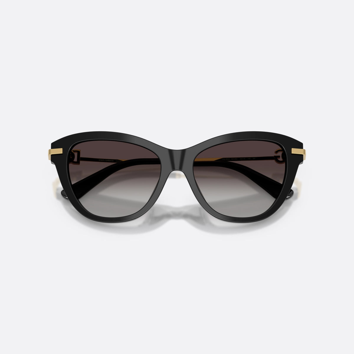 Dolce & Gabbana DG4534 501/8G sunglasses, black butterfly frame for women, plain bridge, brand logo plaque on temple, folded