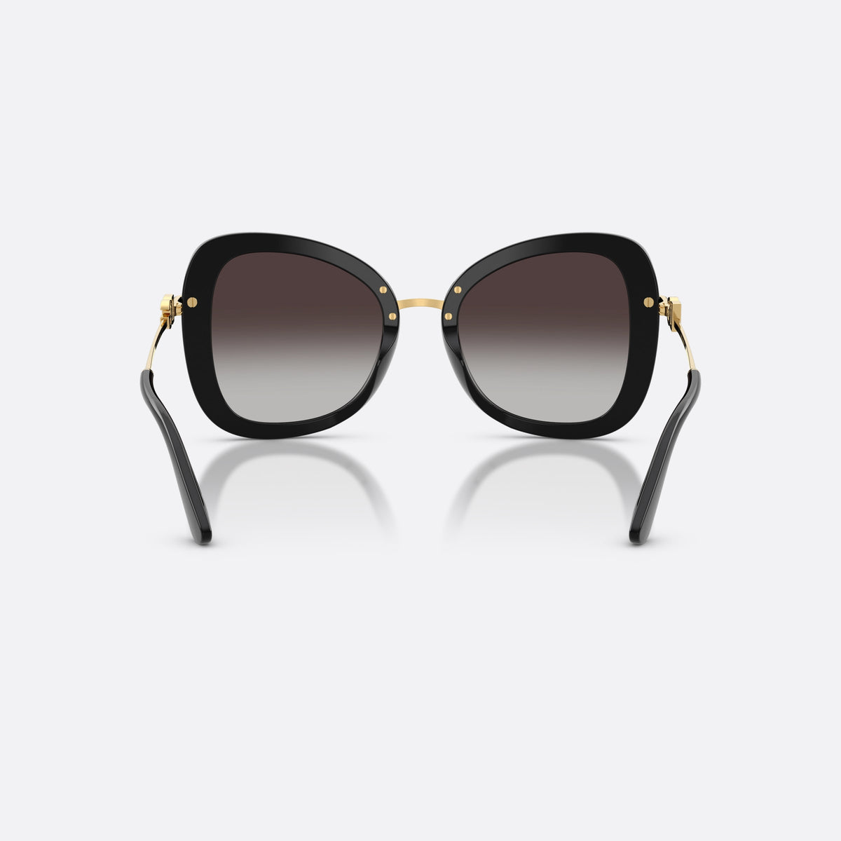 Dolce & Gabbana DG4535 501/8G sunglasses, black butterfly frame for women, metal bridge with gold-tone finish, gradient tinted lenses, back view