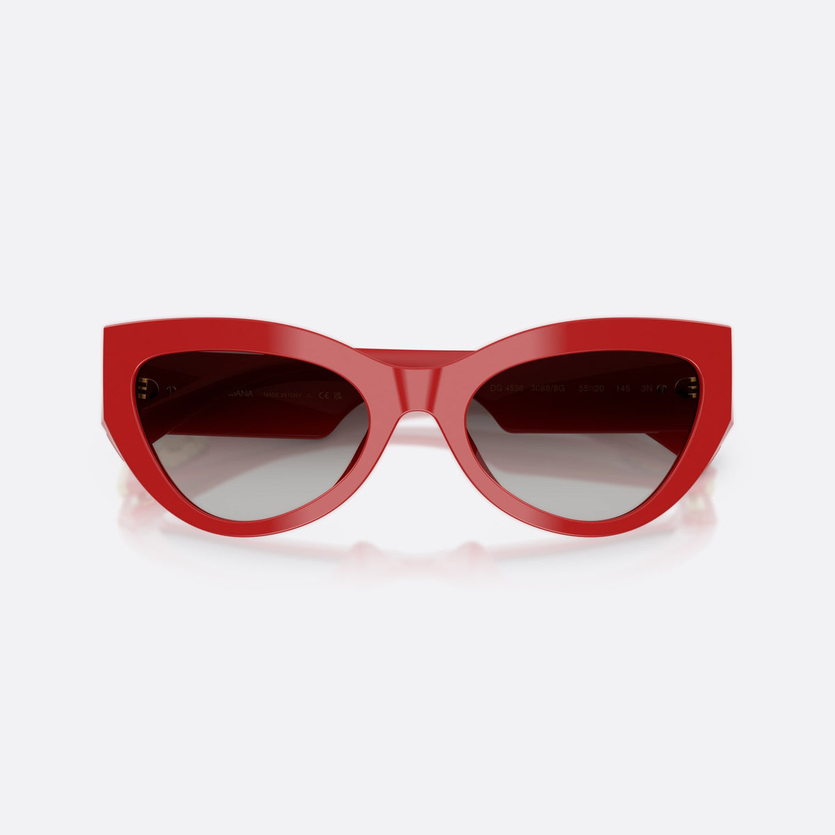 Dolce & Gabbana DG4536 30888G sunglasses, red cat eye frame for women, plain bridge, gold-tone brand plaque on temple, folded
