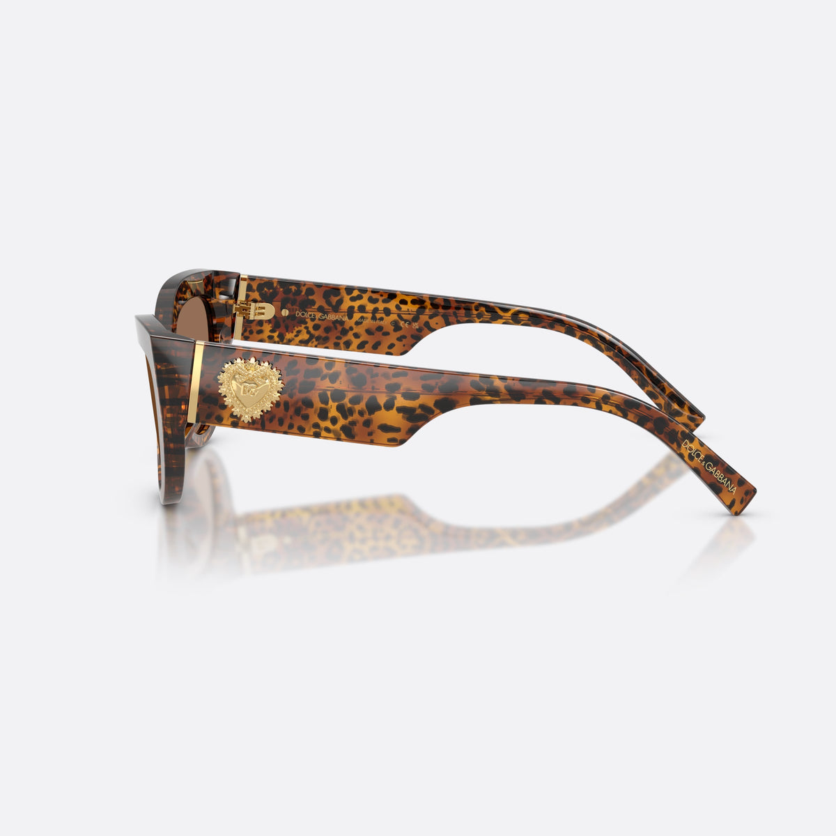 Dolce & Gabbana DG4536 347073 sunglasses, brown cat eye frame for women, keyhole bridge, brand logo on temple plaque, side view