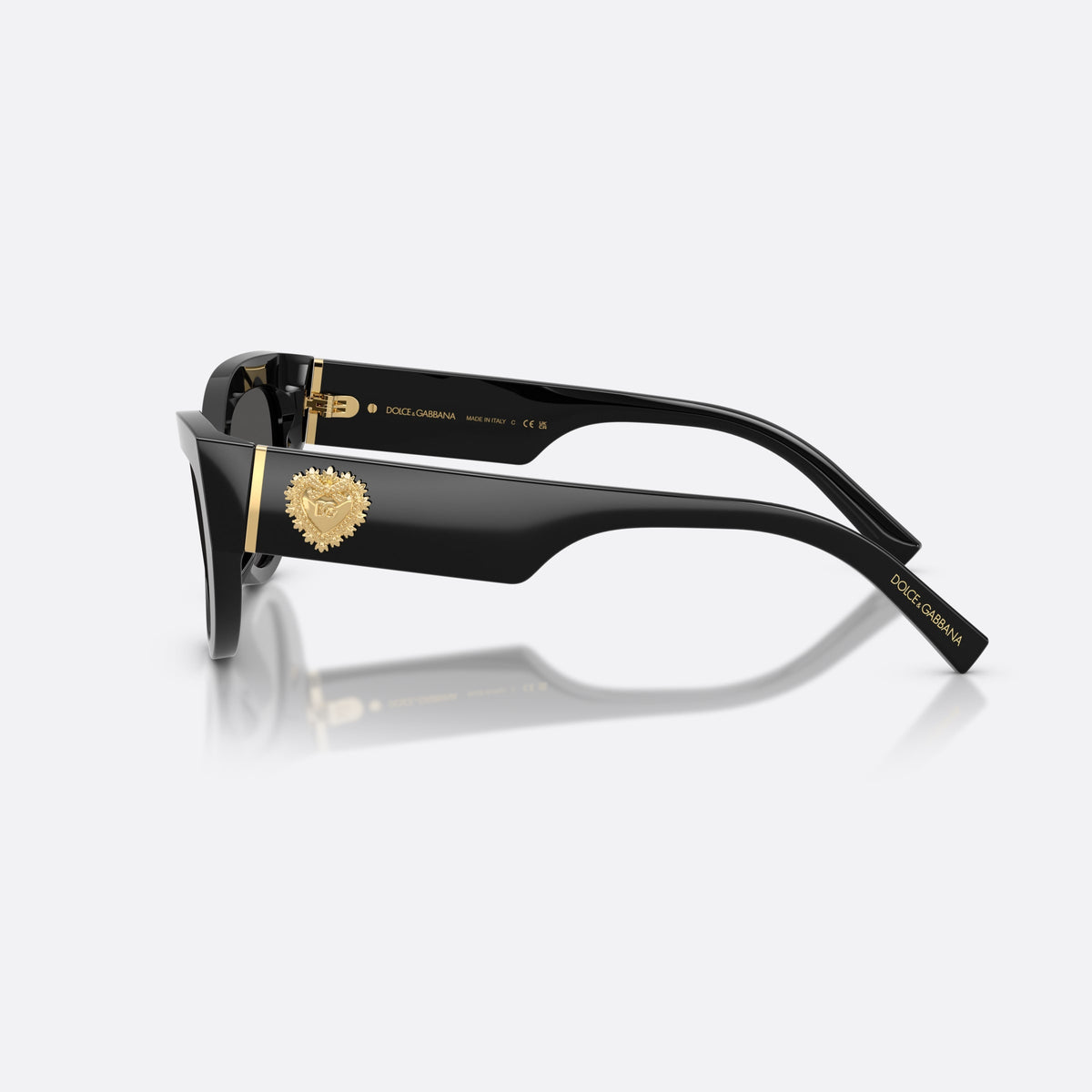 Dolce & Gabbana DG4536 501/87 sunglasses, black cat eye frame for women, plain bridge, brand lettering on temples, wide temples, side view