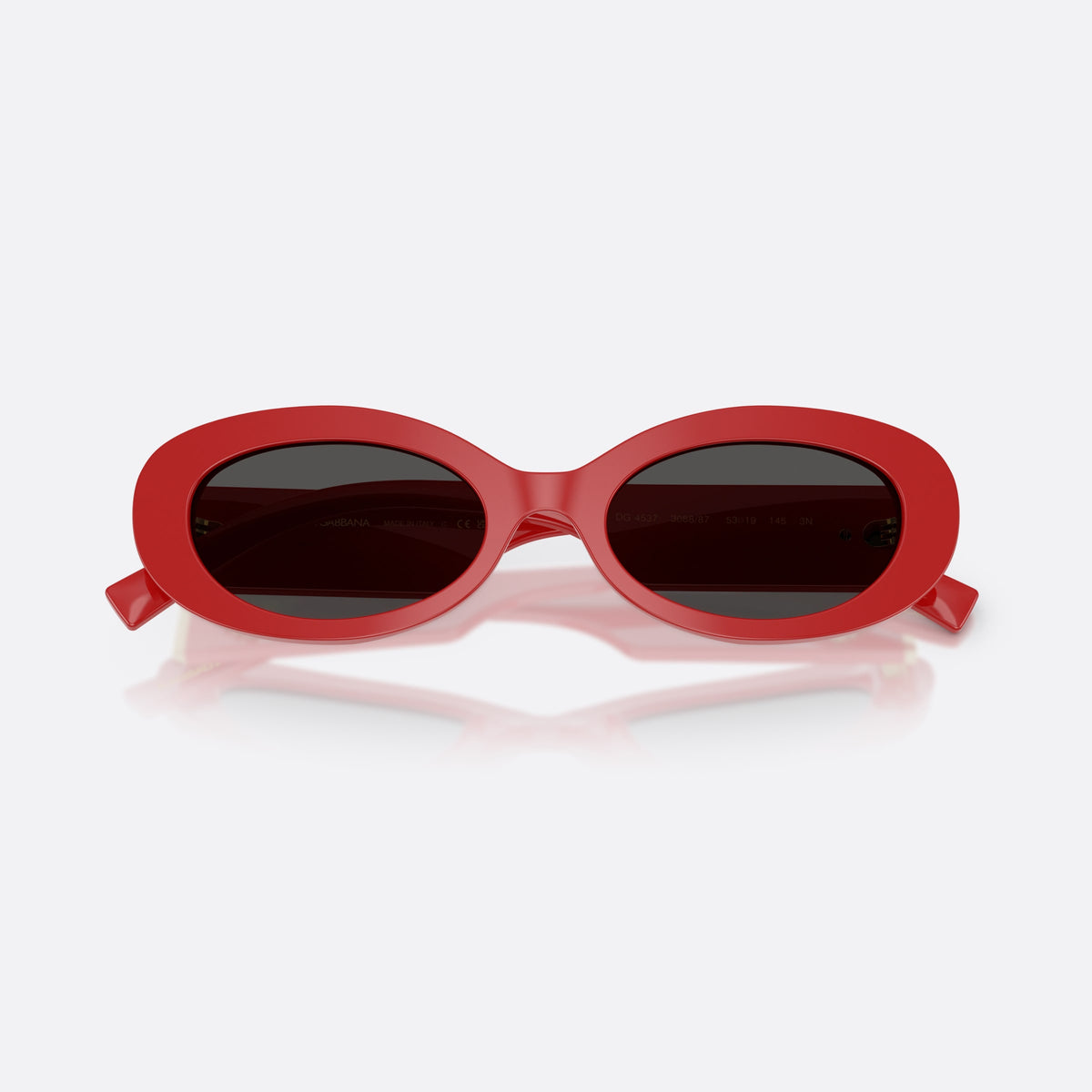 Dolce & Gabbana DG4537 308887 sunglasses, red oval frame for women, plain bridge, brand logo on temple plaque, folded