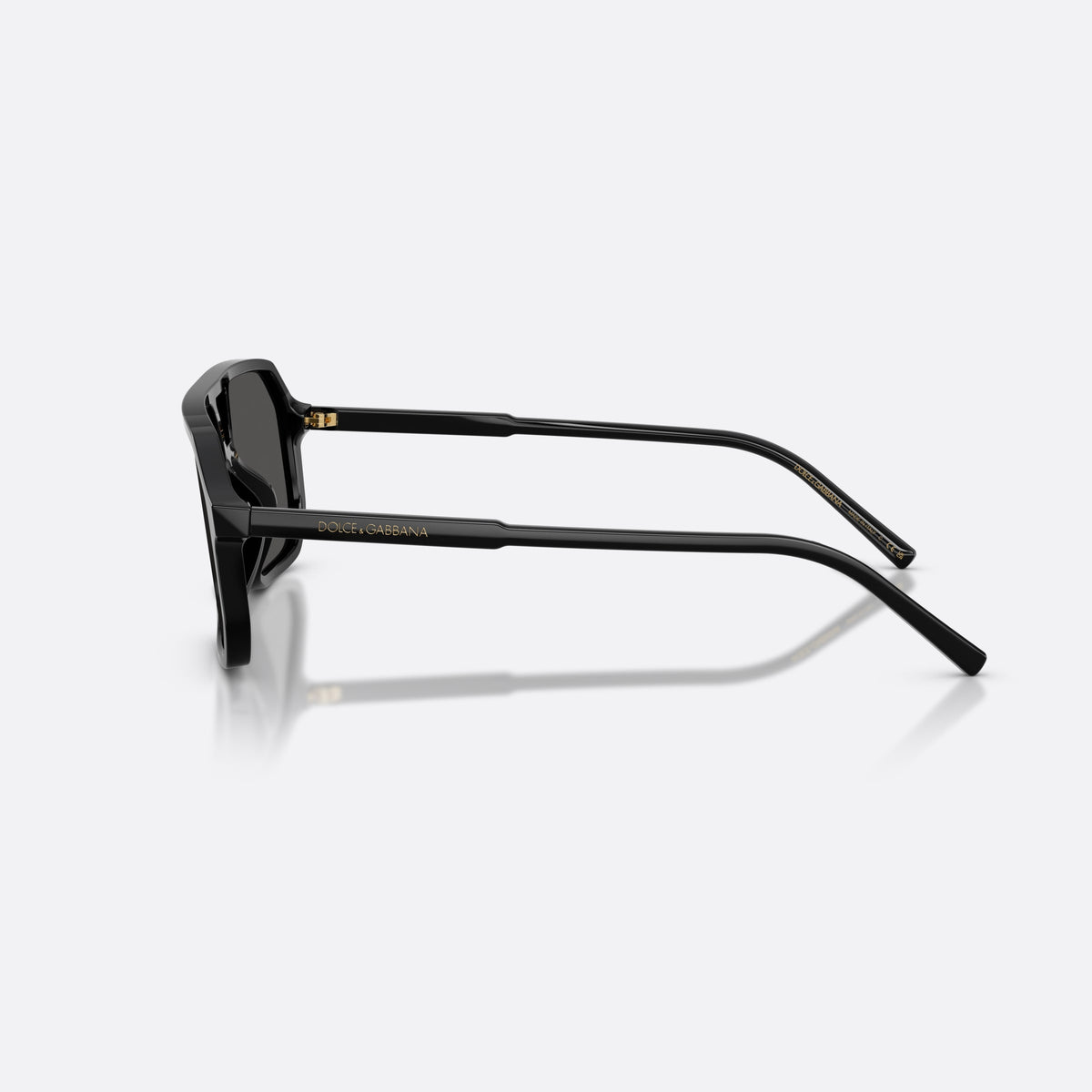 Dolce & Gabbana DG4541 501/87 sunglasses, black pilot frame, unisex, double bridge with open cutout, brand lettering on temples, side view