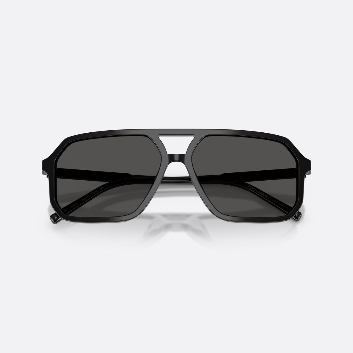 Dolce & Gabbana DG4541 501/87 sunglasses, black pilot frame, unisex, double bridge with open cutout, brand lettering on temples, folded