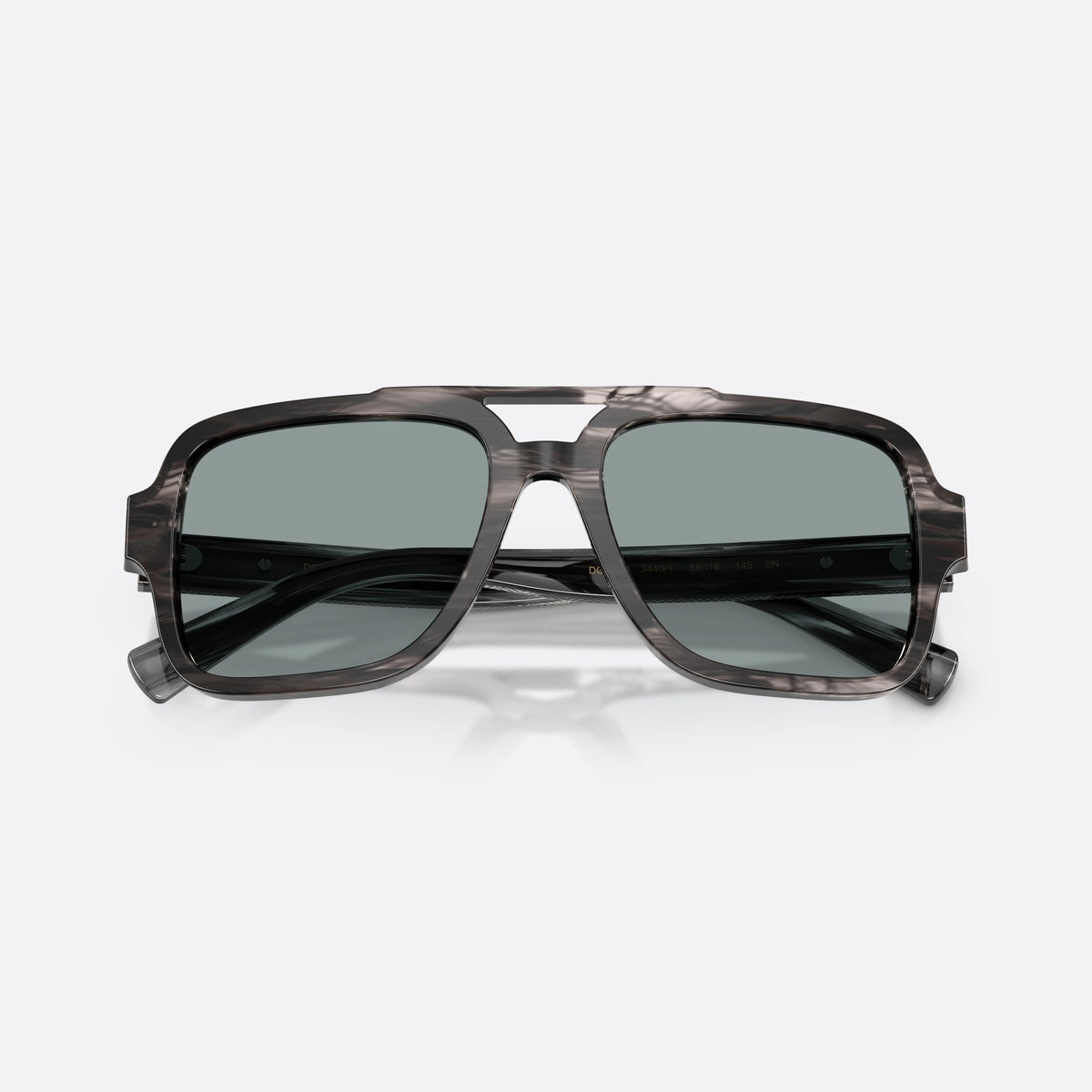 Dolce & Gabbana DG4544 3440/1 sunglasses, grey pilot frame for men, double bridge with top bar, brand lettering on temple, folded