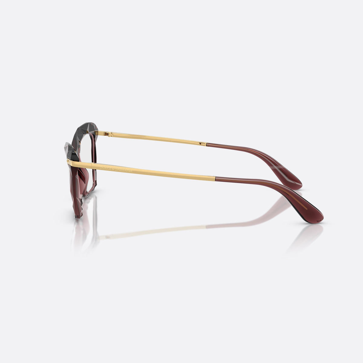 Dolce & Gabbana DG5025 3045 eyeglasses, red cat eye frame for women, plain double-arch bridge, brand lettering on temples, side view