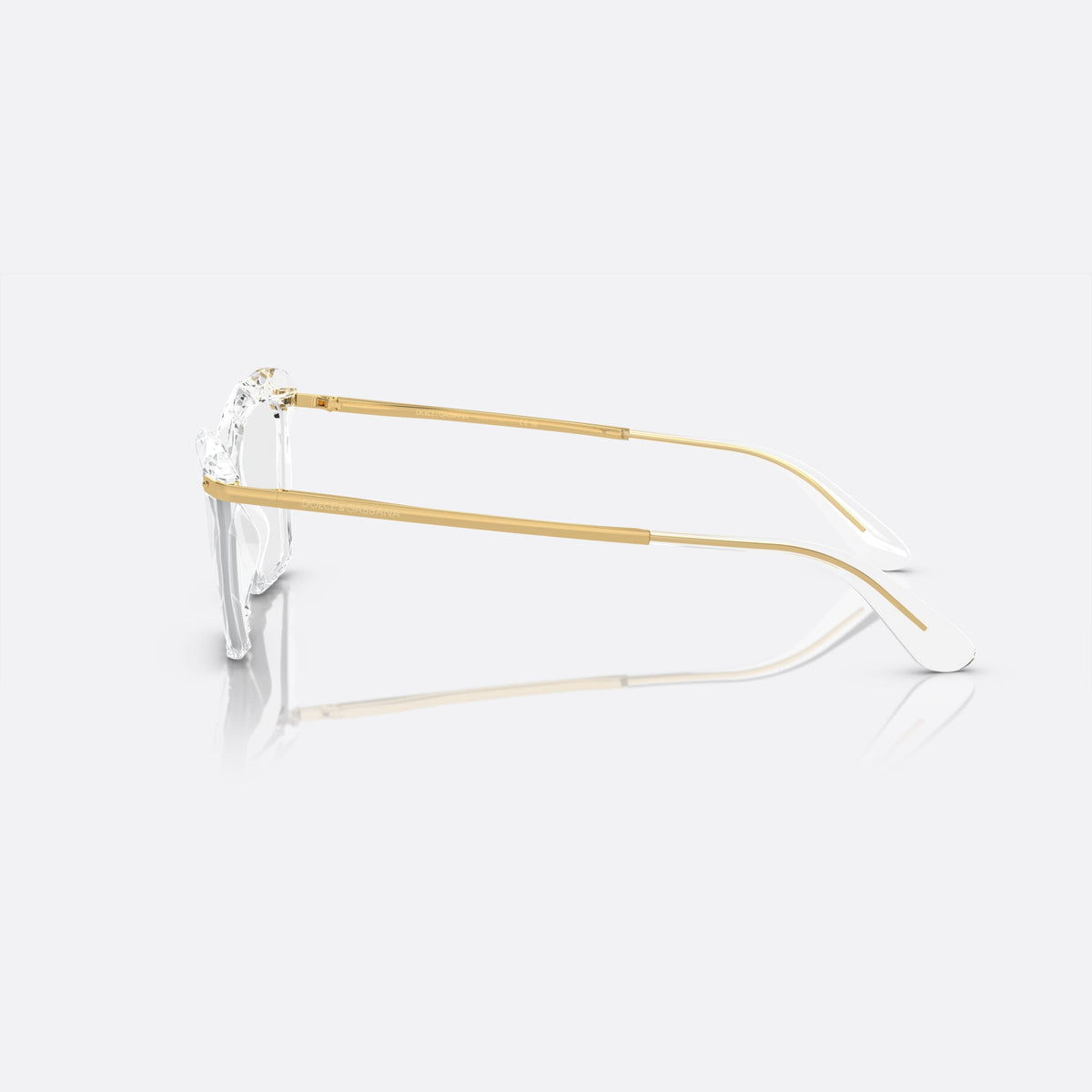 Dolce & Gabbana DG5025 3133 eyeglasses, clear cat eye frame for women, integrated bridge with angled peak, tapered temple ends, side view