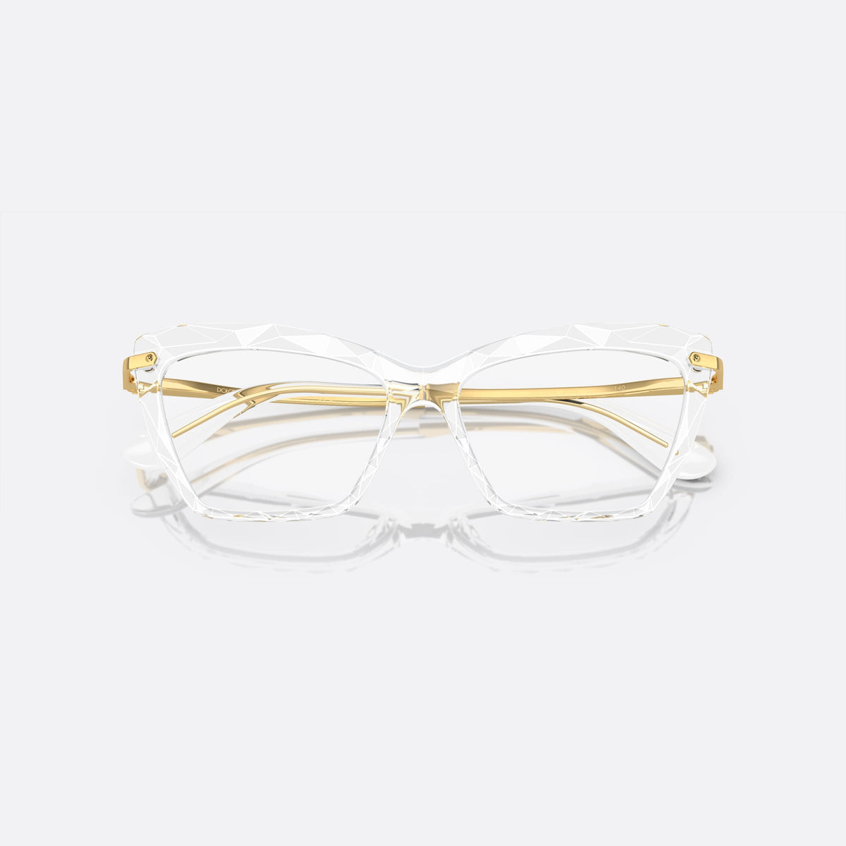 Dolce & Gabbana DG5025 3133 eyeglasses, clear cat eye frame for women, integrated bridge with angled peak, tapered temple ends, folded