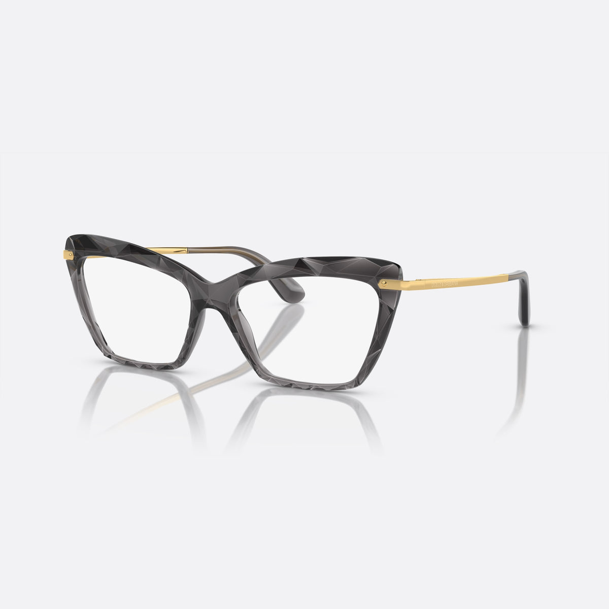 Dolce & Gabbana DG5025 504 eyeglasses, grey cat eye frame for women, double bridge with metal accent, brand lettering on temples