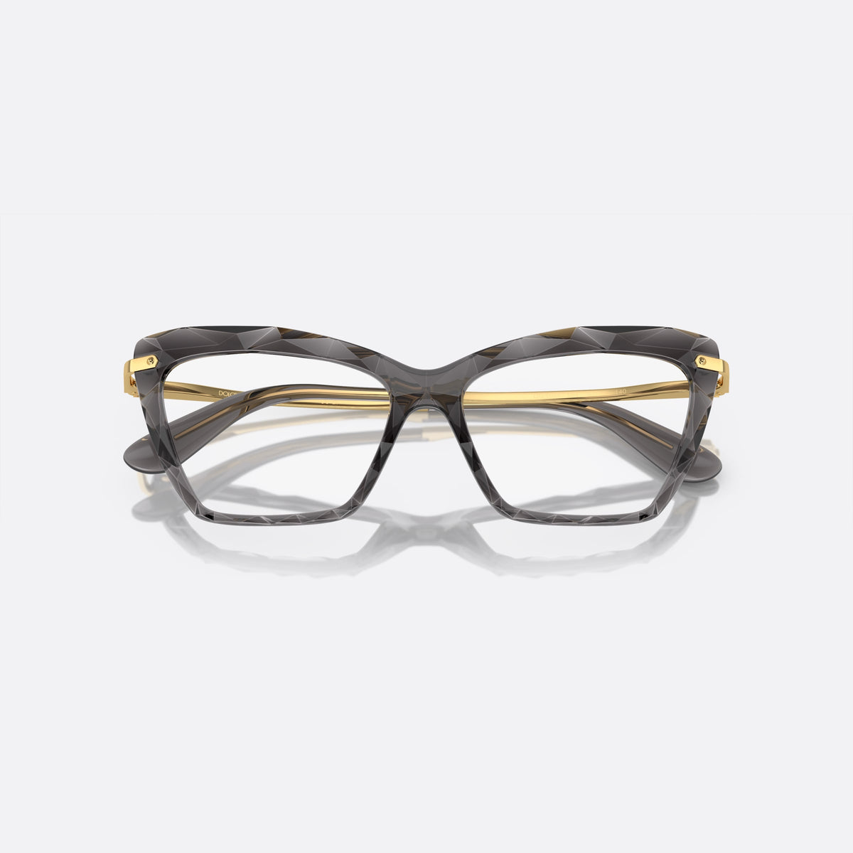 Dolce & Gabbana DG5025 504 eyeglasses, grey cat eye frame for women, double bridge with metal accent, brand lettering on temples, folded