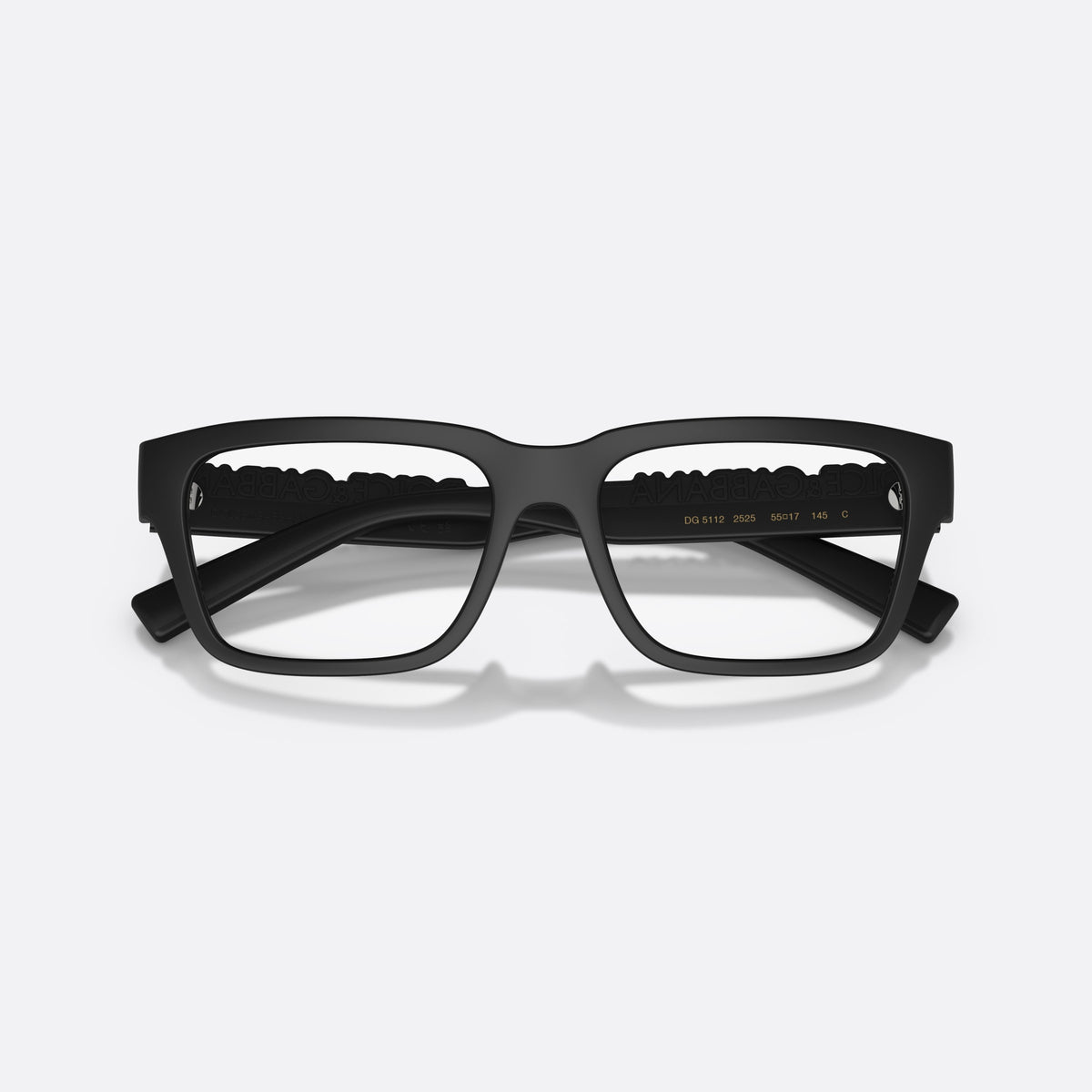 Dolce & Gabbana DG5112 2525 eyeglasses, black rectangle frame, unisex, plain saddle-style bridge, brand lettering on the temples, folded