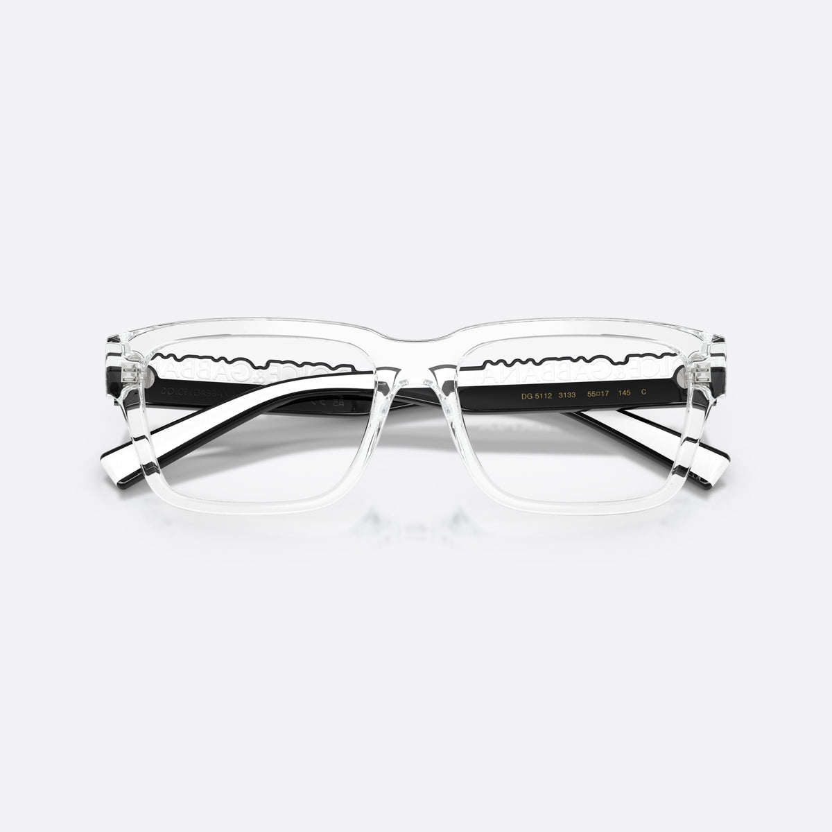 Dolce & Gabbana DG5112 3133 eyeglasses, clear rectangle frame, unisex, plain integrated bridge, brand lettering on temples, folded