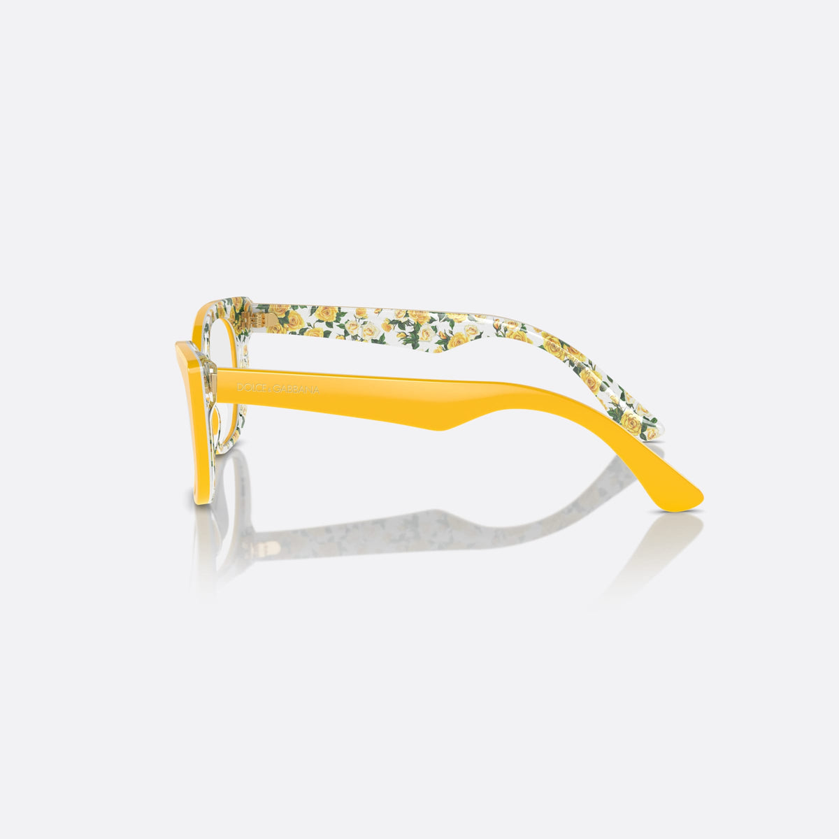 Dolce & Gabbana DX3357 3443 eyeglasses, yellow cat eye frame for kids, plain integrated bridge, brand lettering on temples, side view