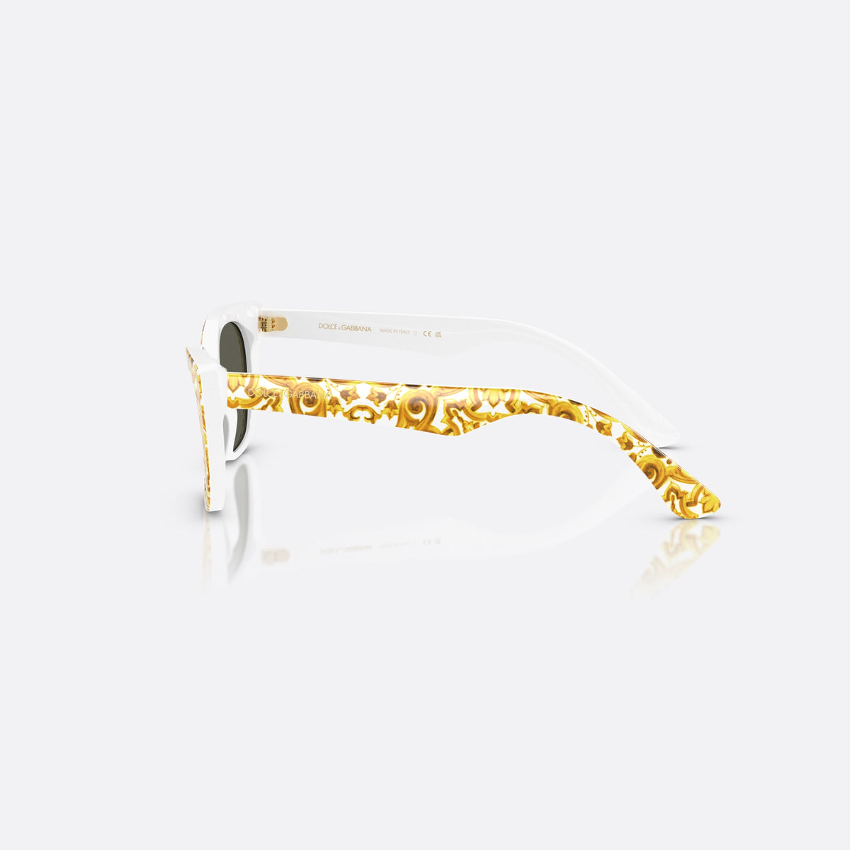 Dolce & Gabbana DX4427 34347P sunglasses, yellow cat eye frame for kids, plain bridge with rounded top, brand lettering on temples, side view