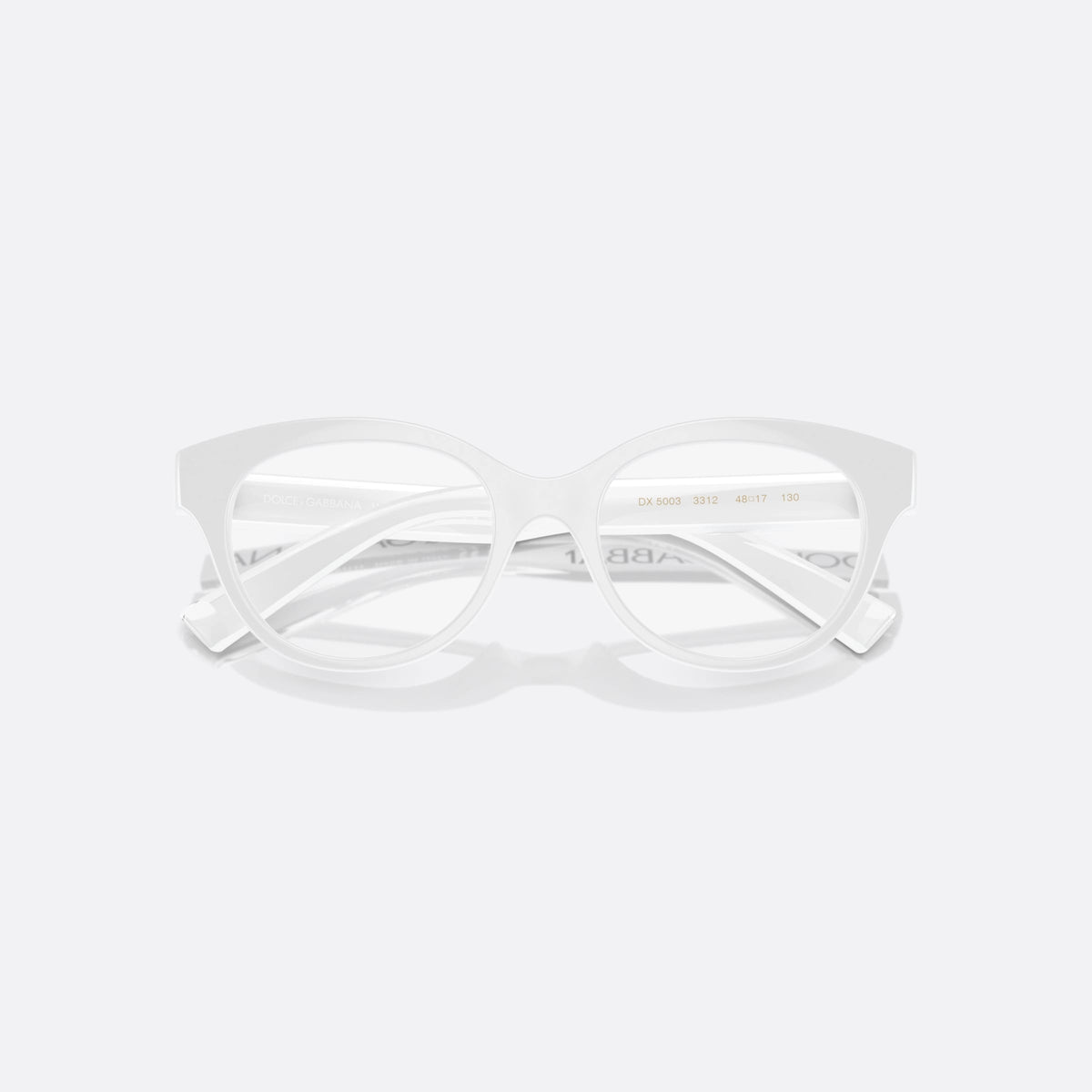 Dolce & Gabbana DX5003 3312 eyeglasses, white phantos frame for kids, plain bridge, brand lettering on temple, full-rim frame, folded