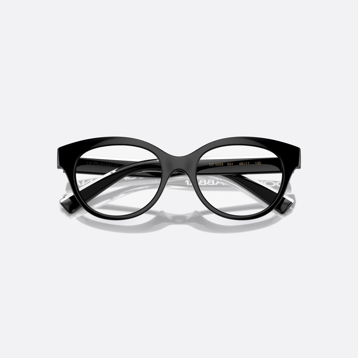 Dolce & Gabbana DX5003 501 eyeglasses, black phantos frame for kids, plain integrated bridge, brand lettering on temples, folded