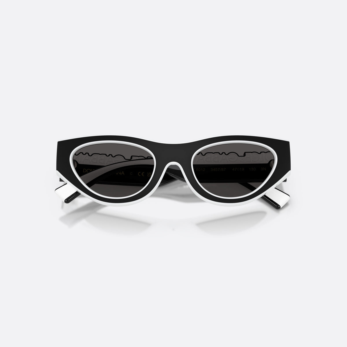 Dolce & Gabbana DX6012 345787 sunglasses, black cat eye frame for kids, plain bridge joining lenses, black hinges on temples, folded