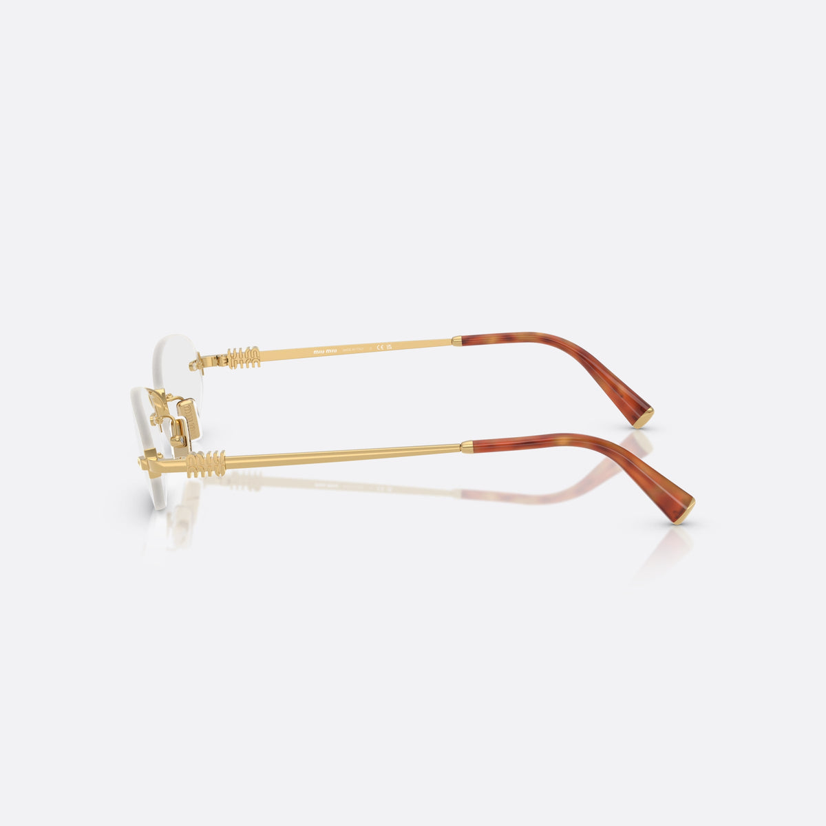 Miu Miu 0MU 53WV 5AK1O1 eyeglasses, gold oval frame for women, metal bridge with arch, brand lettering on temples, side view