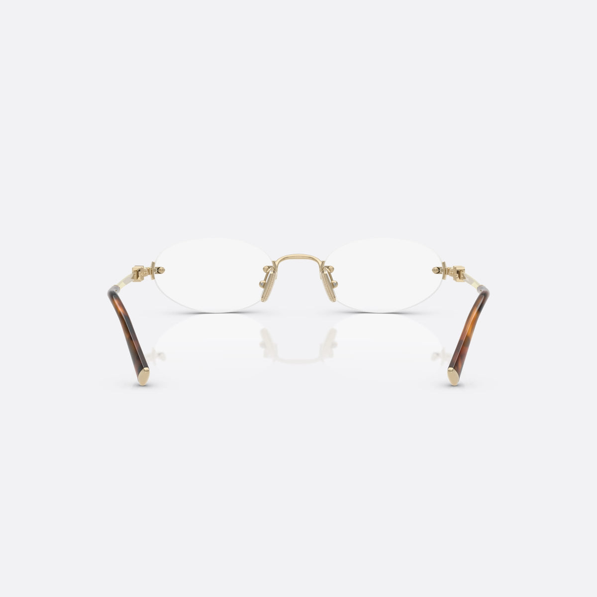 Miu Miu 0MU 53WV ZVN1O1 eyeglasses, gold oval frame for women, metal bridge with slim profile, metal hinges, back view
