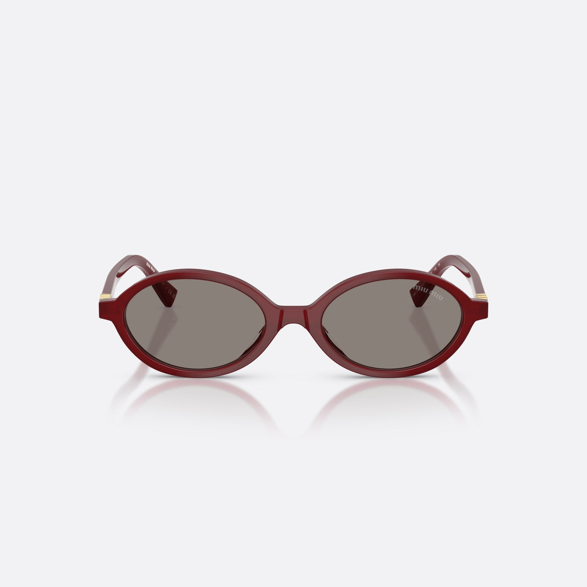 Miu Miu MU 04ZS 21I80Q sunglasses, red oval frame for women, plain bridge, brand lettering on temples, full-rim frame, front view