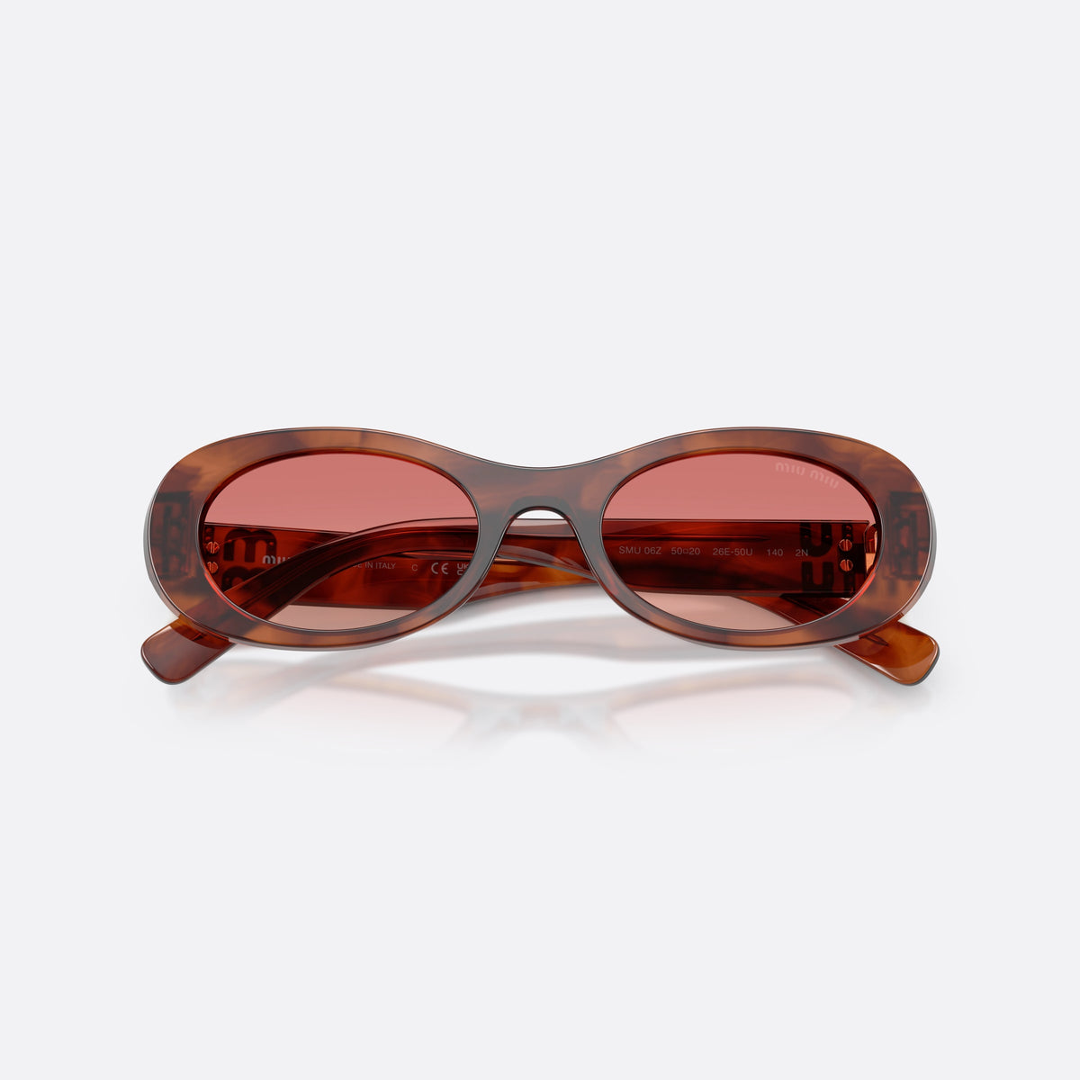 Miu Miu MU 06ZS 26E50U sunglasses, brown oval frame for women, plain bridge, brand lettering on temples, full-rim frame, folded
