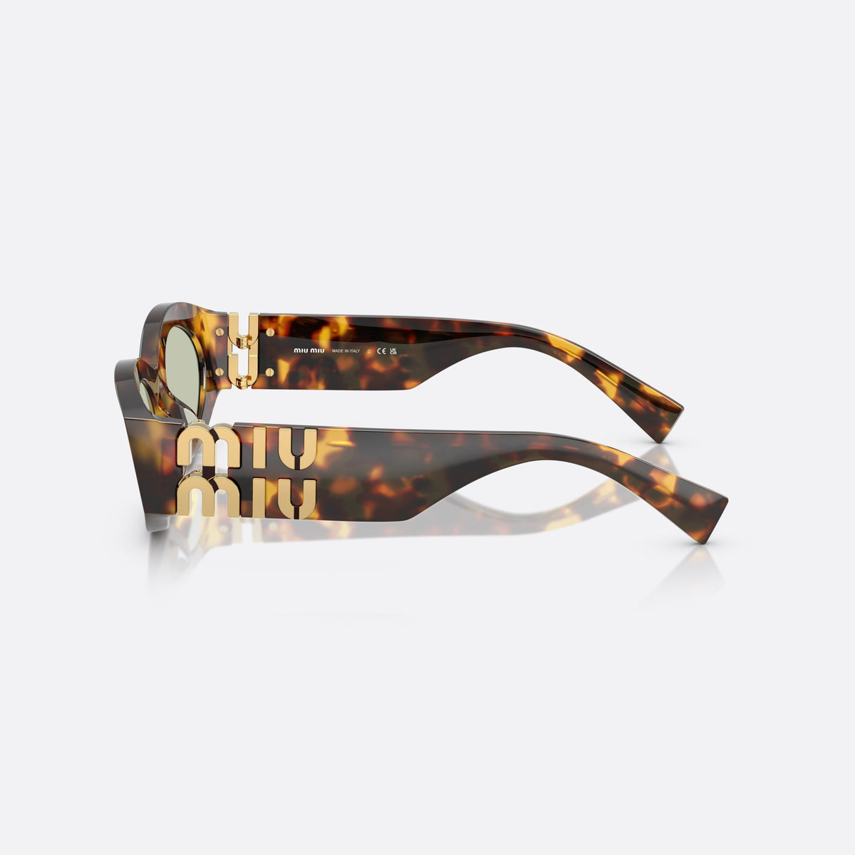 Miu Miu MU 11WS 14L50O sunglasses, havana oval frame for women, keyhole bridge, brand logo on temple, wide tapered temples, side view