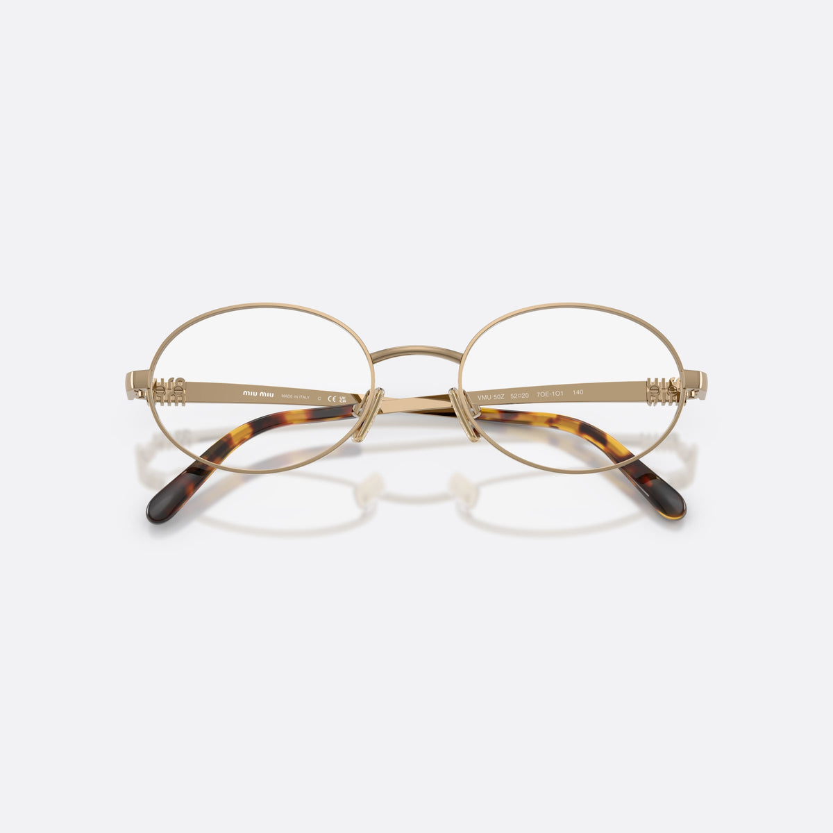 Miu Miu MU 50ZV 7OE1O1 eyeglasses, gold oval frame for women, plain metal bridge, brand lettering on temples, folded