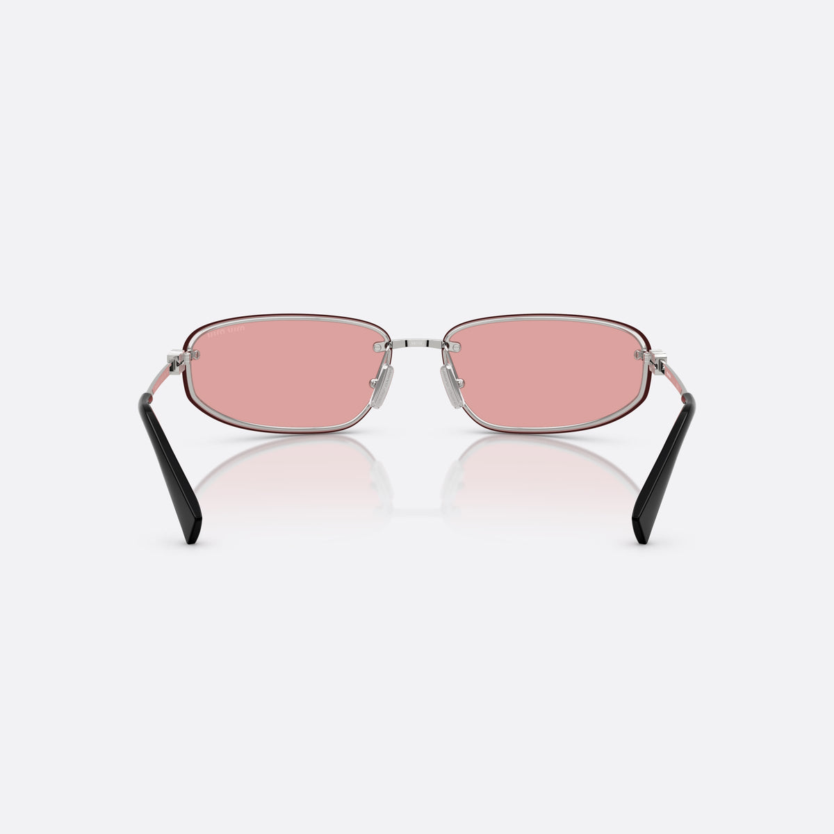 Miu Miu MU A50S 1BC70J sunglasses, silver oval frame for women, integrated metal bridge, brand lettering on temples, back view