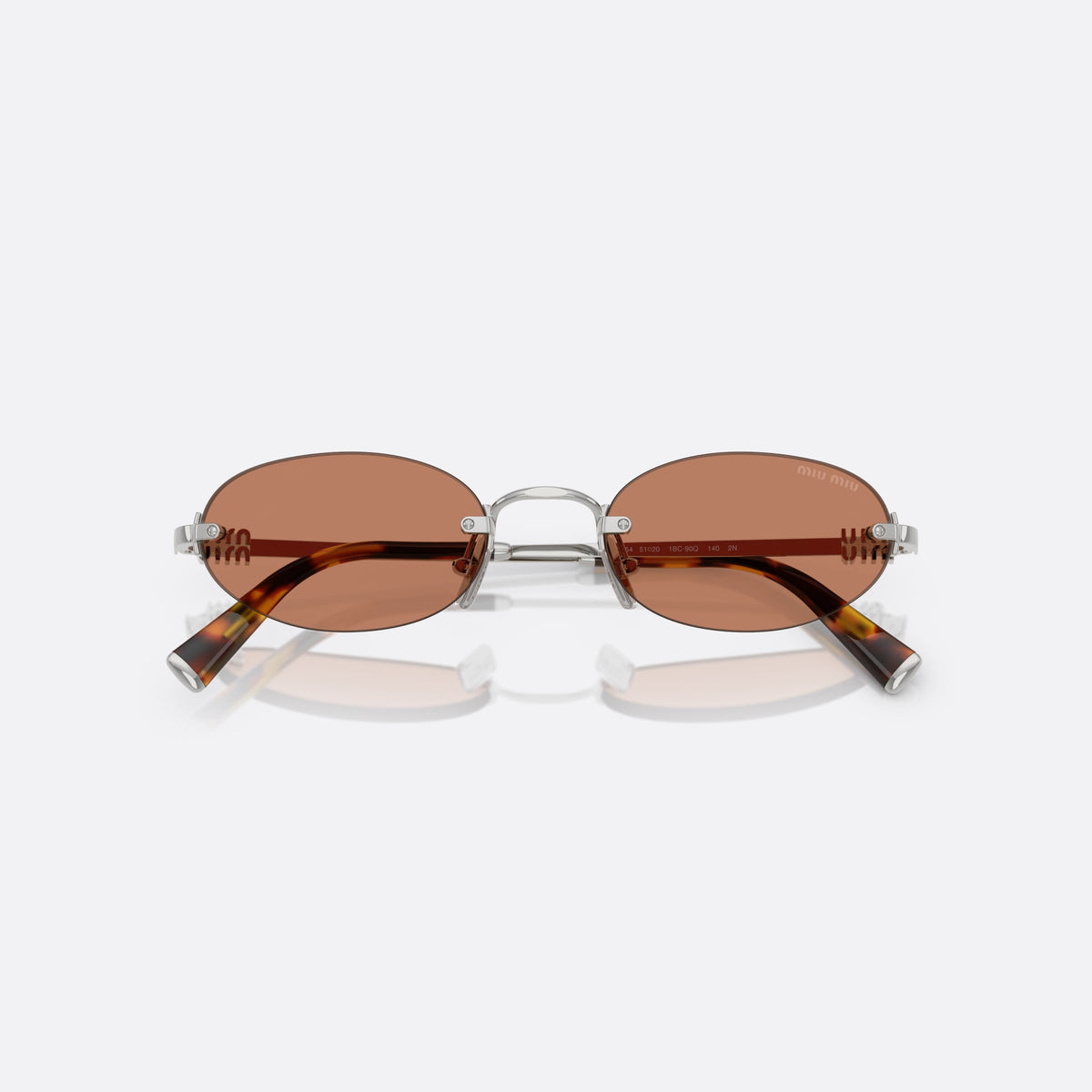 Miu Miu MU A54S 1BC90Q sunglasses, silver oval frame for women, plain metal bridge, brand logo on temples, folded