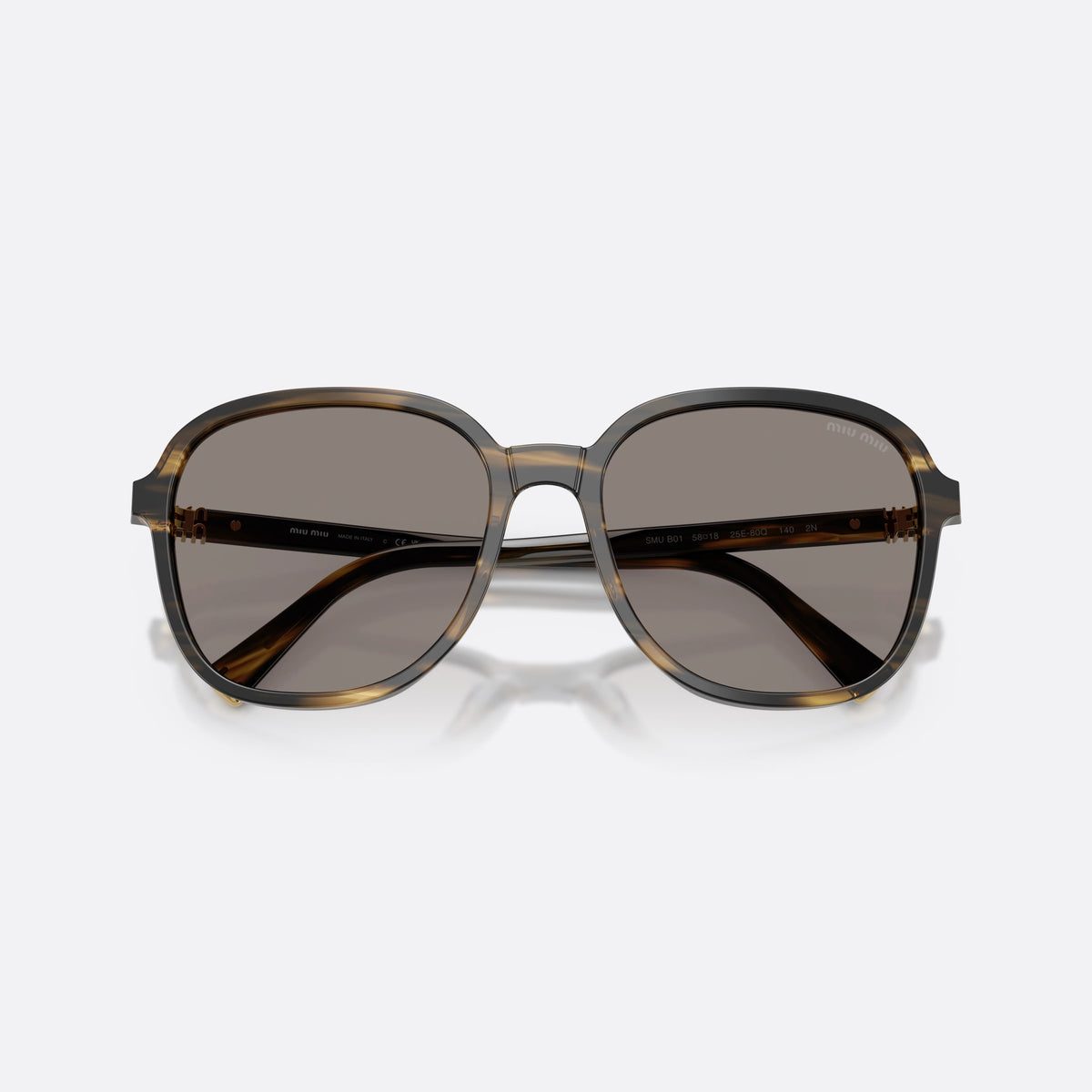 Miu Miu MU B01S 25E80Q sunglasses, green pillow frame for women, plain bridge, brand lettering on temples, full-rim frame, folded