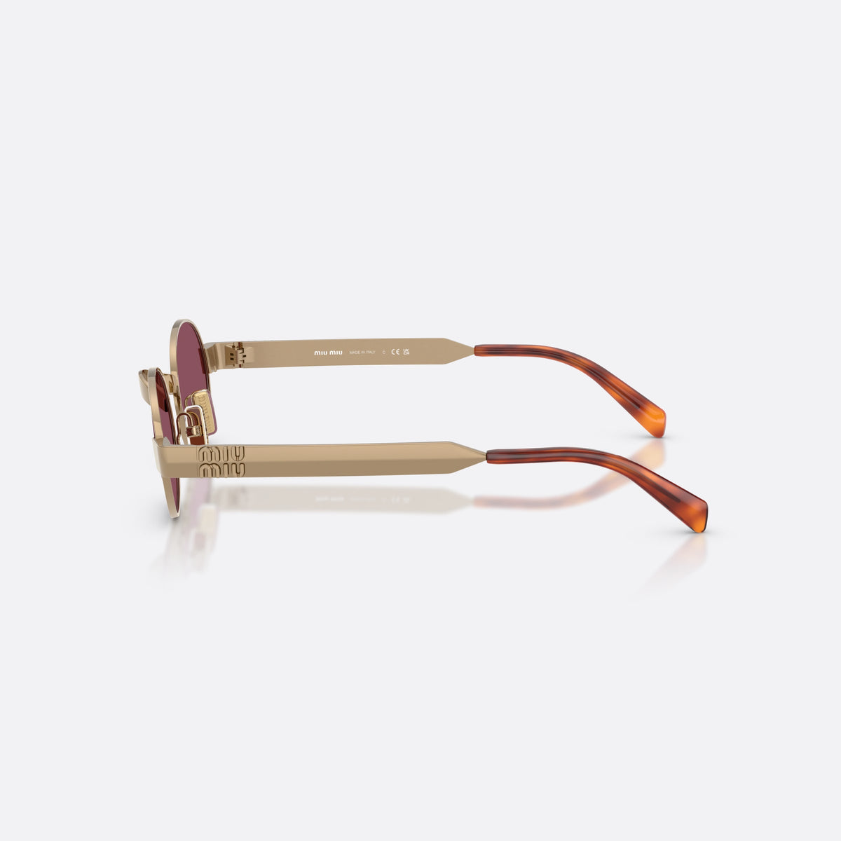 Miu Miu MU B51S 7OE30Y sunglasses, brown oval frame for women, metal saddle bridge, brand lettering on temples, side view
