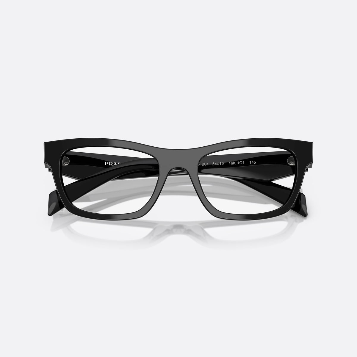 Prada MOD. B01V 16K1O1 eyeglasses, black visor frame for women, plain saddle-style bridge, brand lettering on temples, folded