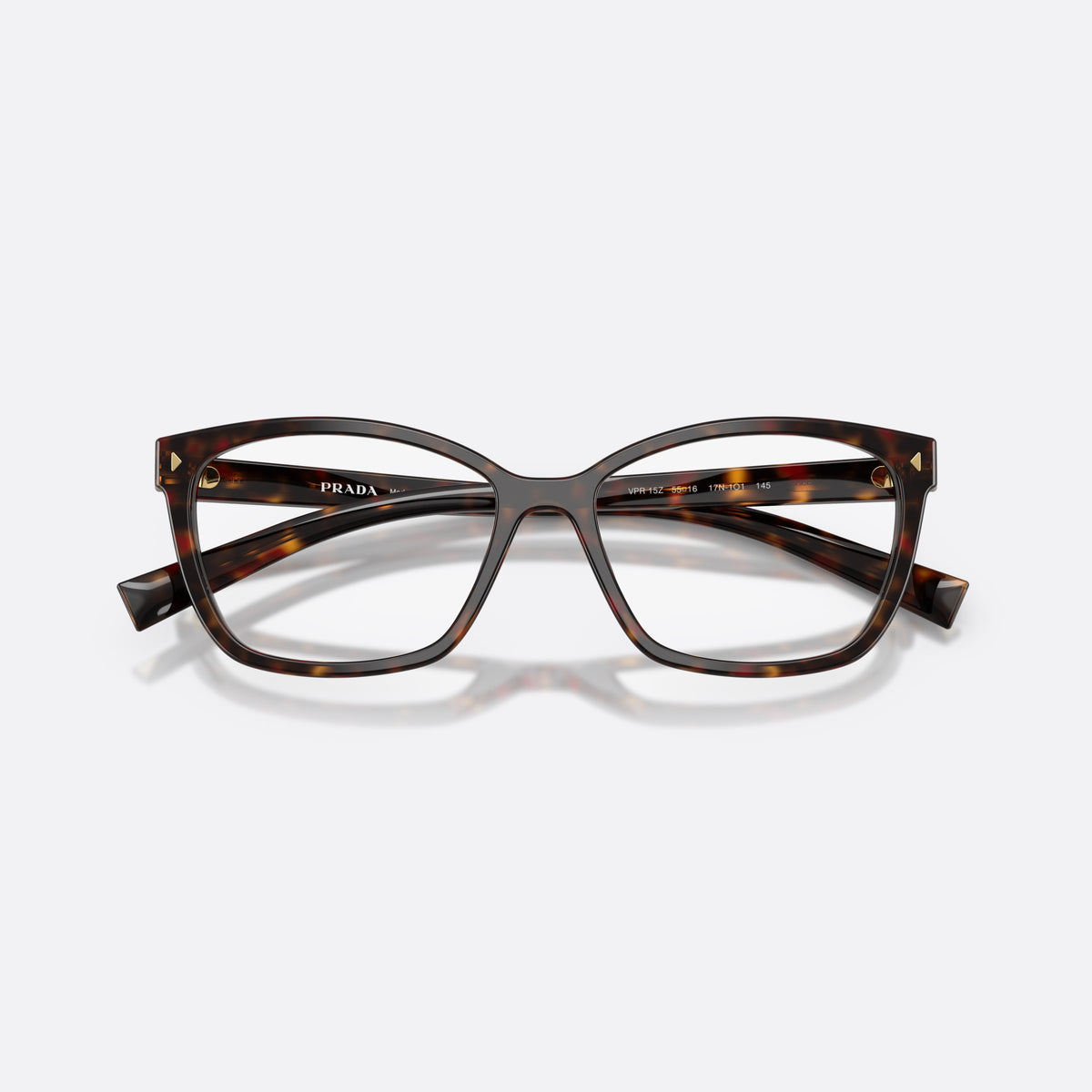 Prada PR 15ZV 17N1O1 eyeglasses, havana rectangle frame for women, plain double bridge, brand lettering on temple, folded