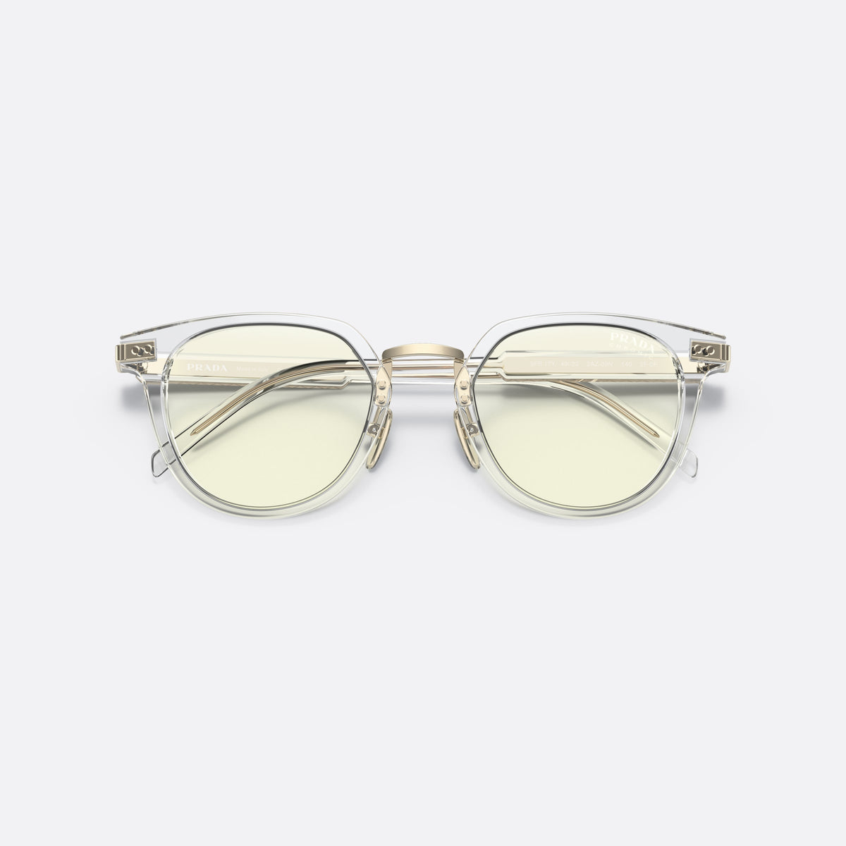 Prada PR 17YS 2AZ09N sunglasses, clear phantos frame for men, brand lettering on the temples, full rim frame, folded
