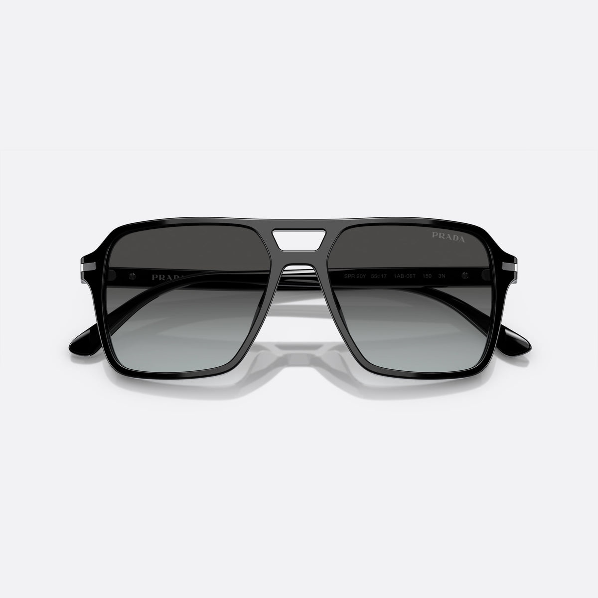 Prada PR 20YS 1AB06T BLGR sunglasses, black pilot frame for men, double bridge with cutout, brand lettering on temples, folded