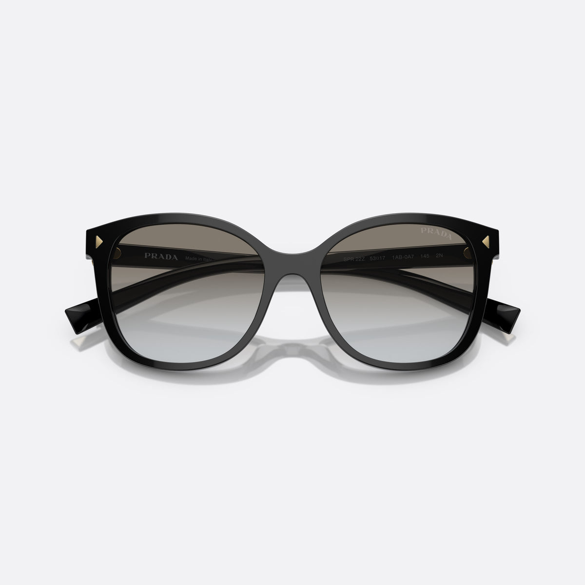 Prada PR 22ZS 1AB-0A7 sunglasses, black square frame for women, plain bridge, brand lettering on temple, full-rim frame, folded