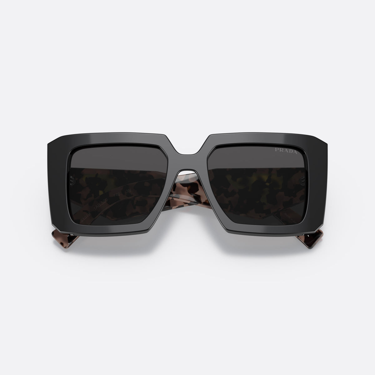Prada PR 23YS 1AB5/S0 sunglasses, black square frame for women, keyhole bridge, brand lettering on temples, full-rim frame, folded