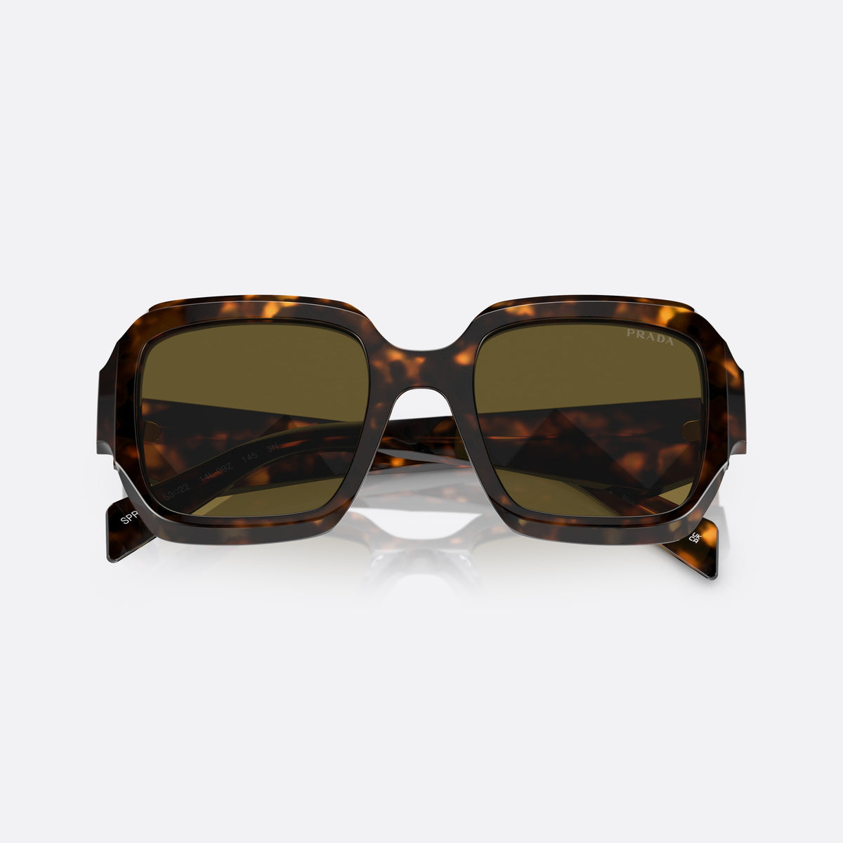 Prada PR 28ZS 14L-09Z sunglasses, green pillow frame for women, plain integrated bridge, brand lettering on temples, folded