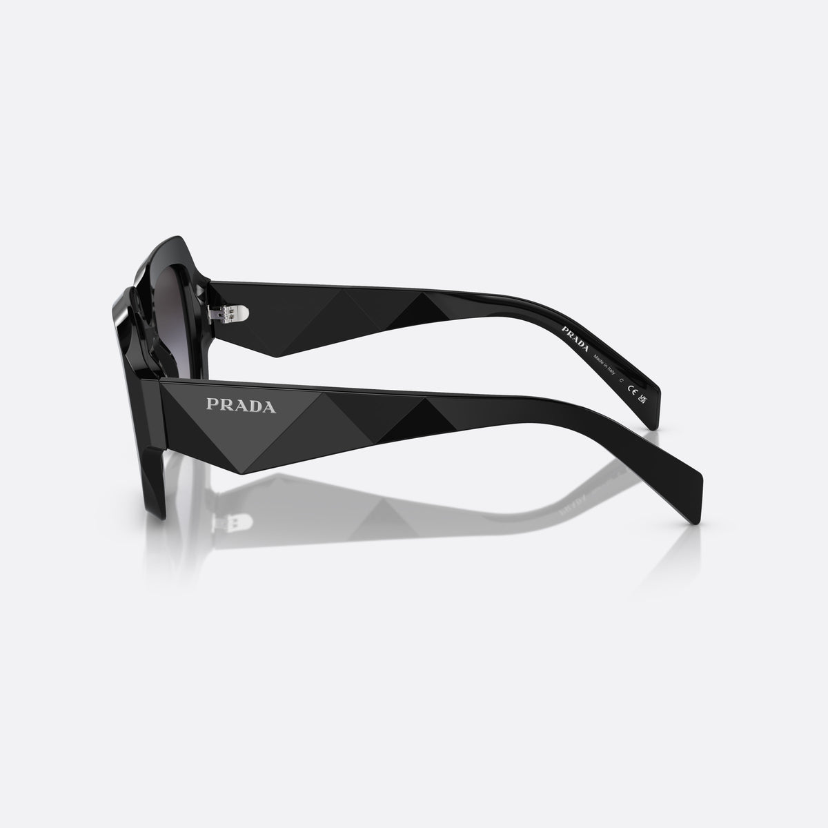 Prada PR 28ZS 16K-90A sunglasses, black pillow frame for women, plain double-arch bridge, brand lettering on the temples, side view