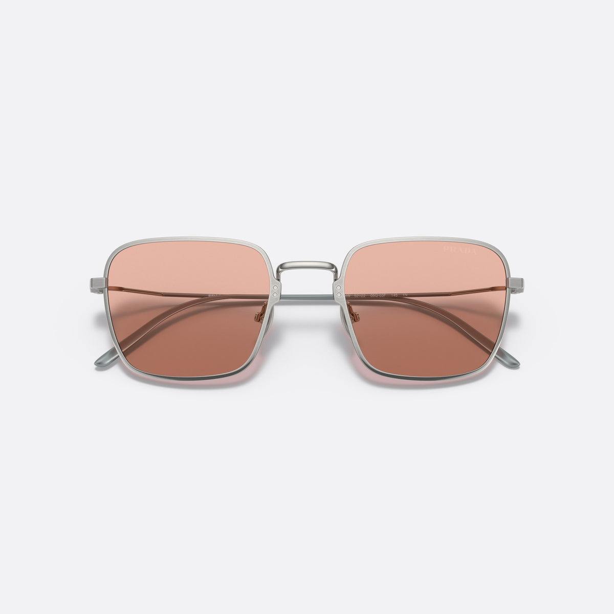 Prada PR 54WS 05Q-03F sunglasses, silver rectangle frame for women, double metal bridge, brand lettering on lens, folded