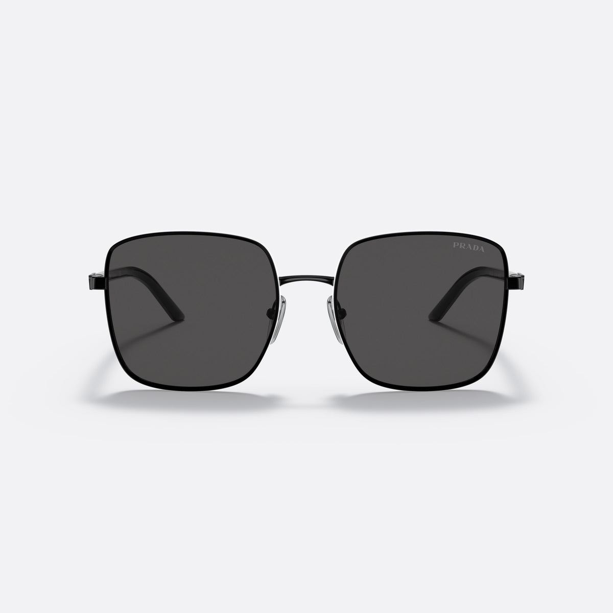 Prada PR 55YS 1AB5S0 sunglasses, black pillow frame for women, thin metal bridge, brand logo plaque on temple, front view